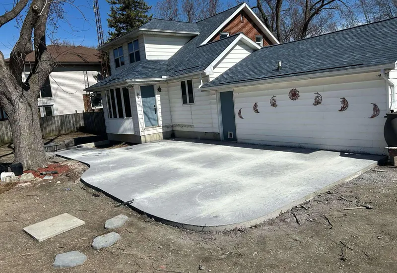 Basement walkout with extended patio area completed