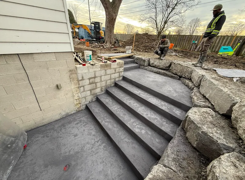 Concrete path installation for basement walkout
