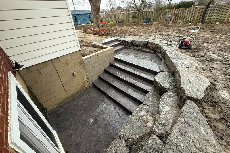 Completed concrete steps for basement walkout