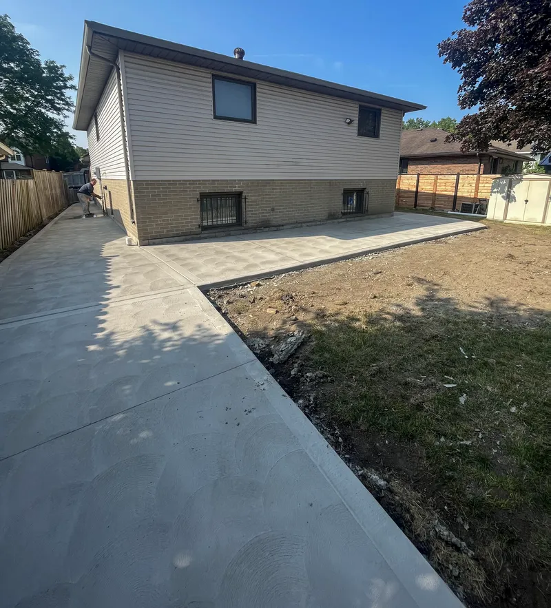 Corner view of completed concrete driveway in Windsor