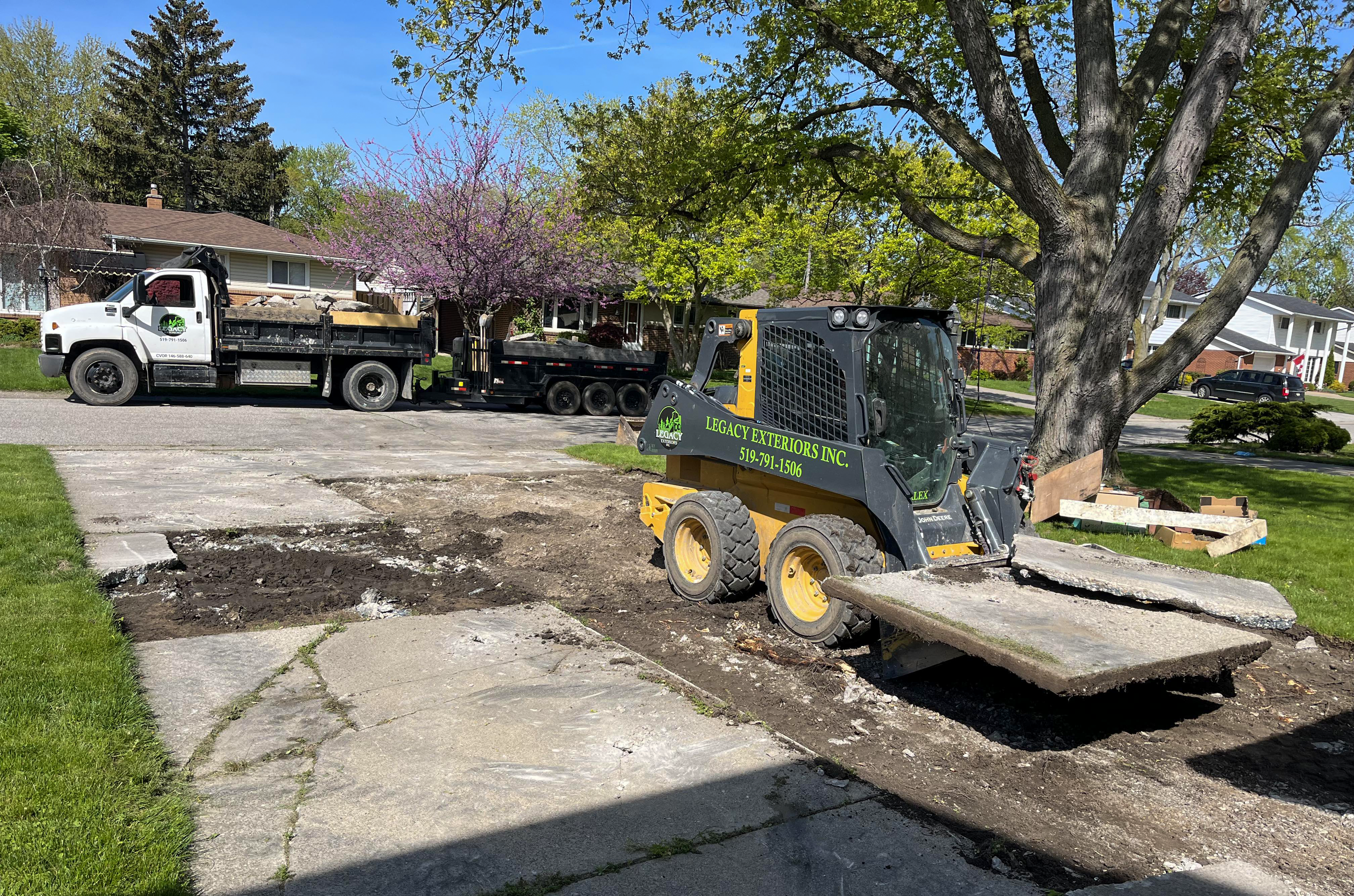 Damaged driveway before replacement