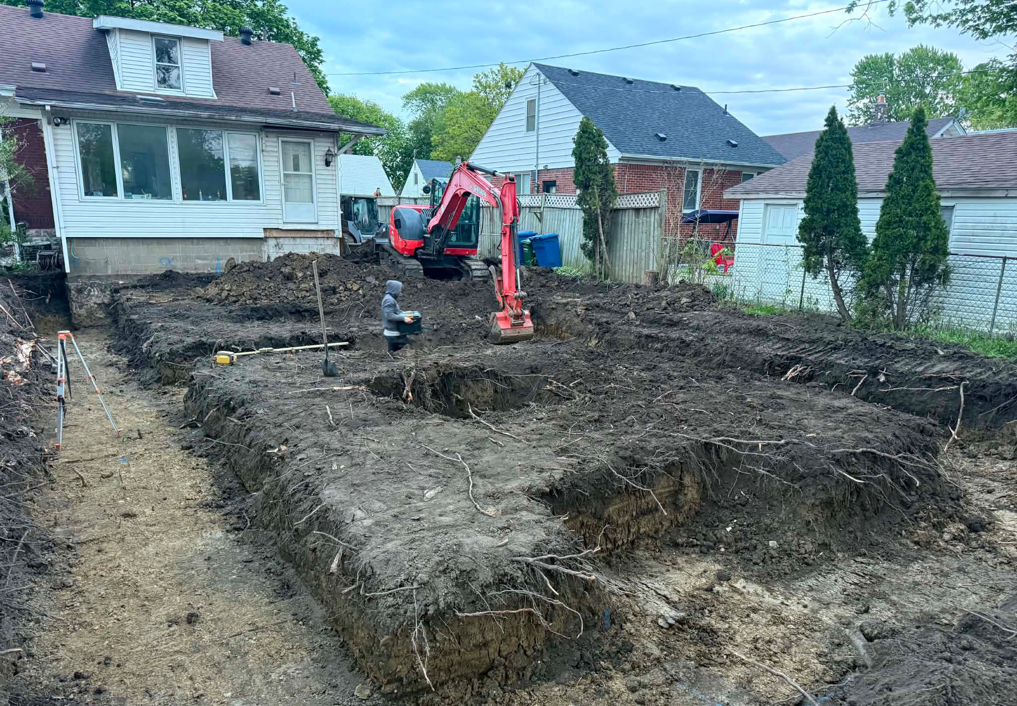 Completed foundation footing excavation for a residential addition