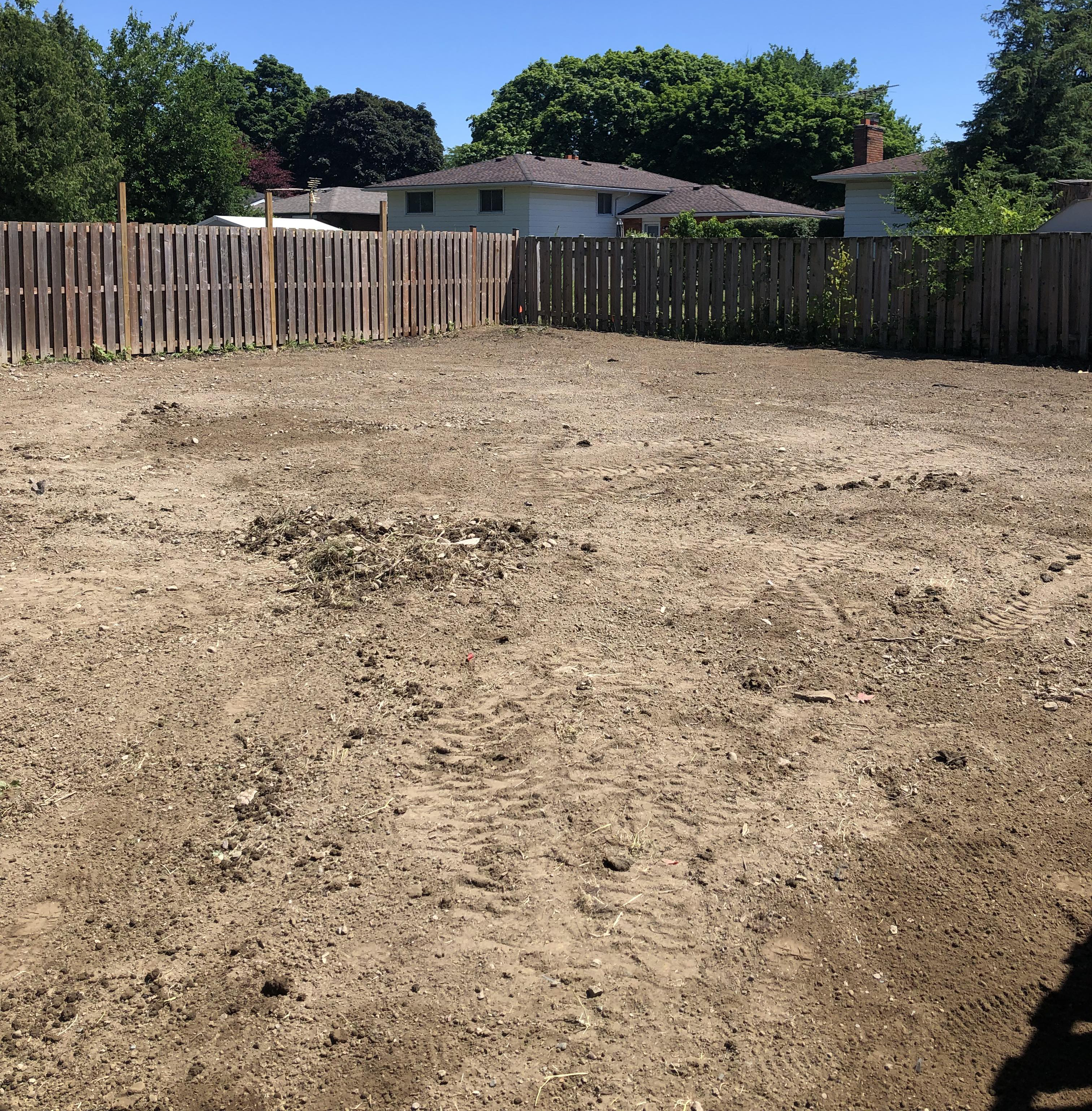 Graded and prepared soil before sod installation