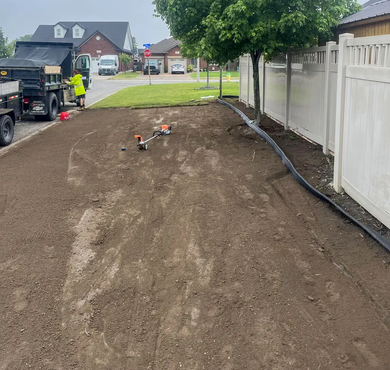 Graded and levelled soil prepared for sod in Windsor